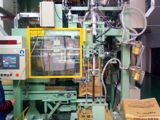  自動(dòng)上袋機